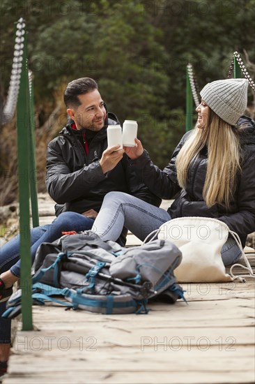 Couple nature drinking water 1