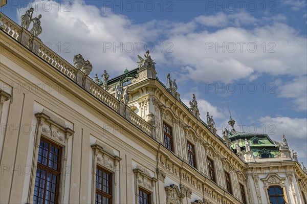Stone figures on the roof of the upper baroque Belvedere Palace