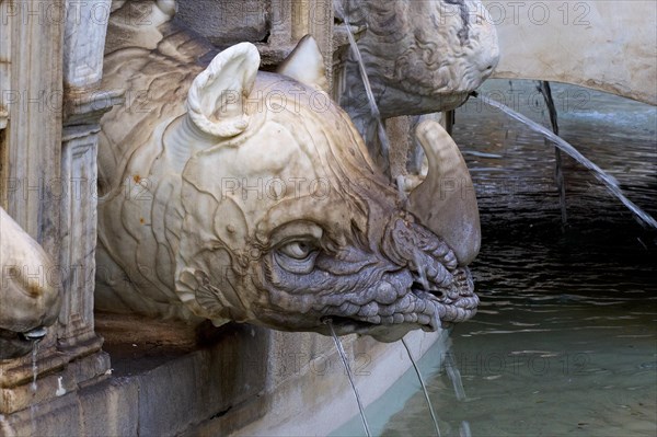 Marble head of a mythological animal