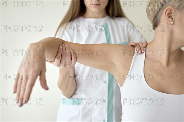 Female patient undergoing physical therapy