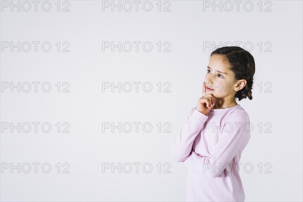 Little girl pondering