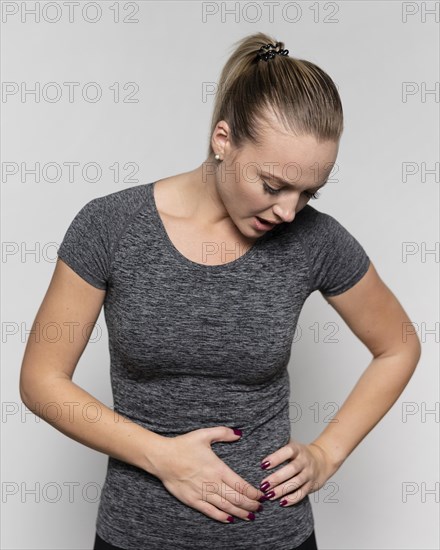 Front view woman with hip pain