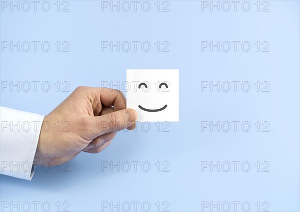 Top view arrangement with smiley emoji card