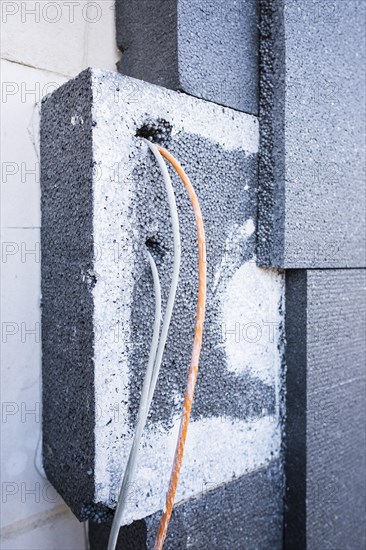 Insulation panels on a house facade of a new building