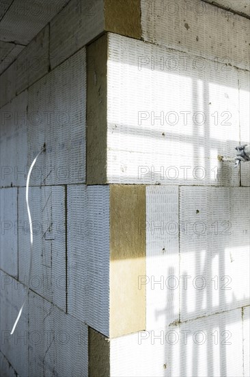 Mineral wool insulation panels on a house wall