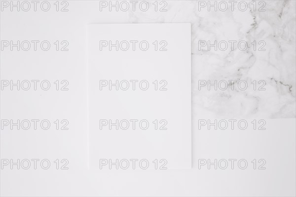 Blank paper white desk background