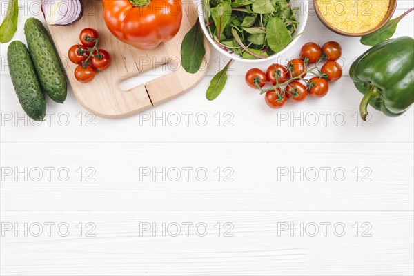 Elevated view fresh vegetables white wooden desk