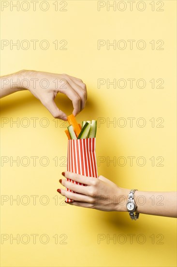 Close up person sharing vegetables