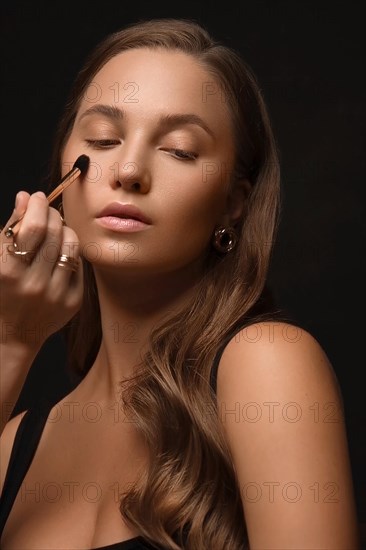 Beautiful young girl with a light natural make-up