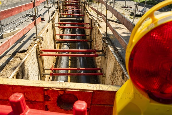 Construction work on a new district heating pipeline for the use of waste heat from an industrial plant in the Benrath district