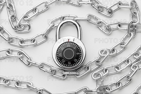 Flat lay metal chain with lock