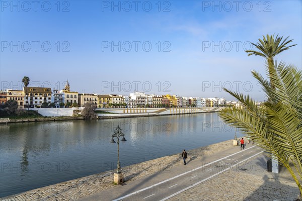 Waterfront and the colourful houses of the Triana district on the Guadalquivir River