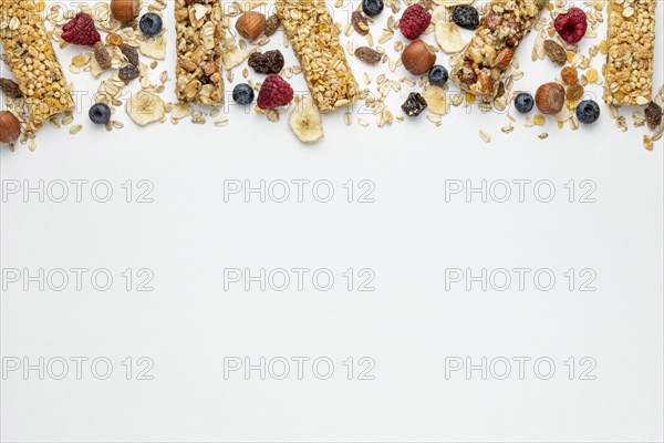 Top view breakfast cereal bars with fruits copy space