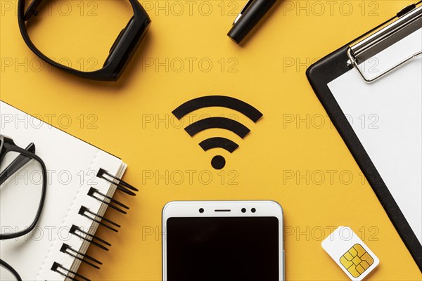 Top view wi fi symbol with smartphone sim card