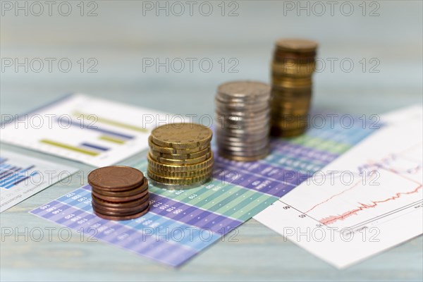 Currency change piles coins