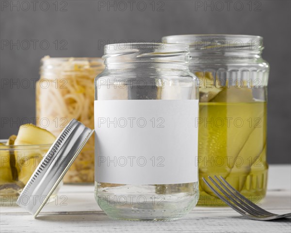 Front view pickled vegetables clear jars