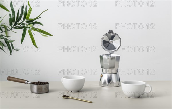 Front view table with coffee cup kettle