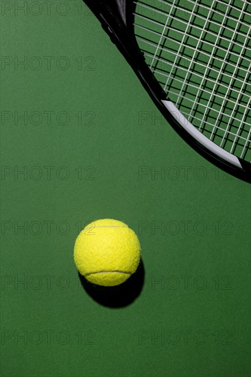 Top view tennis ball with racket