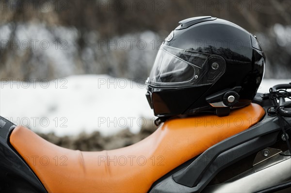 Close up motorcycle with helmet