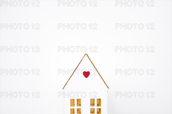 Toy house with small heart