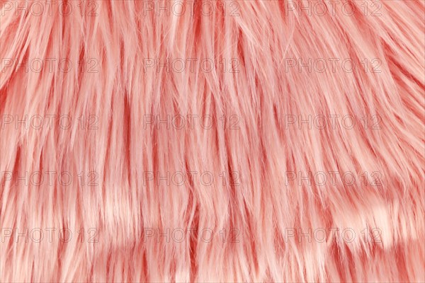 Close up of long pink synthetic fake fur