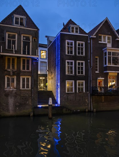 Gracht with old houses in the blue hour in Dordrecht