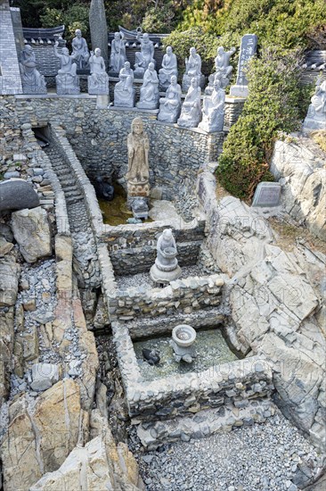 Lucky fountain with stone figures