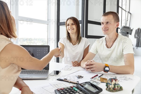 Couple making deal about their new house