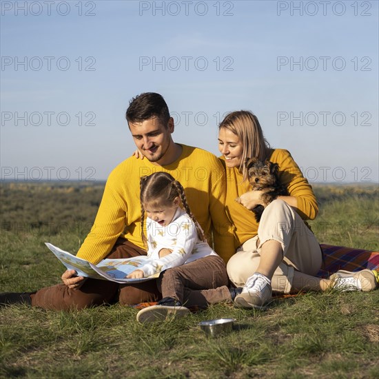 Family with child dog