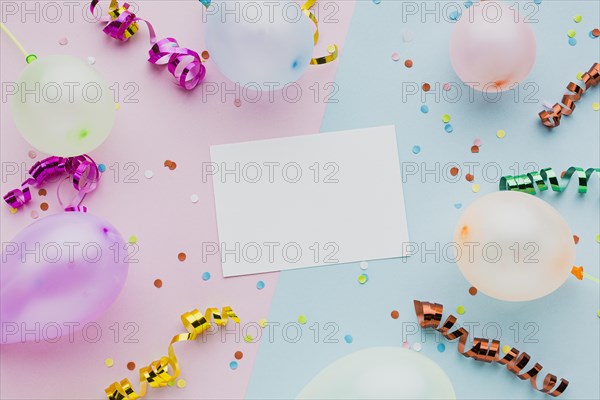 Top view assortment with balloons card