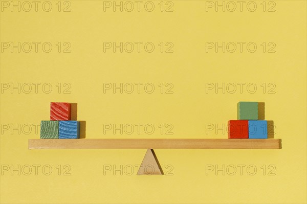 Arrangement with wooden colorful cubes