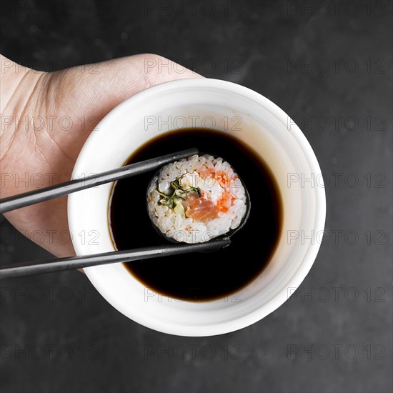 Bowl with sauce sushi