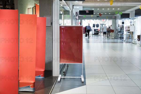 Empty sign mockup inside shopping center