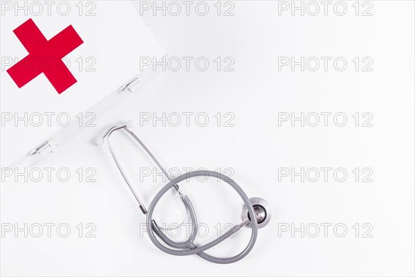 First aid kit with stethoscope white background