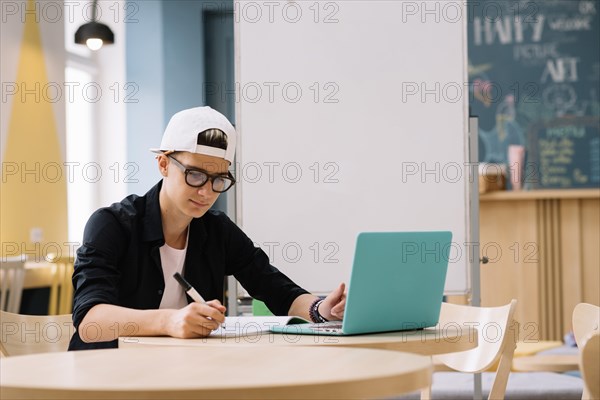 Student working with laptop