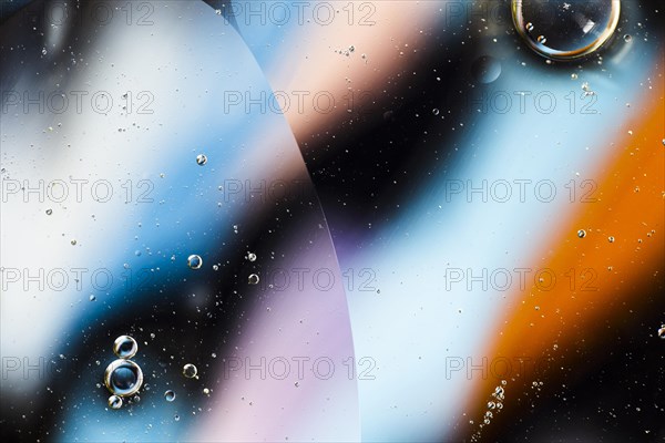 Abstract colourful backdrop oil waves water surface
