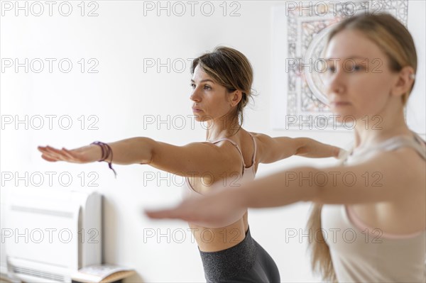 Yoga teacher teaching class 4