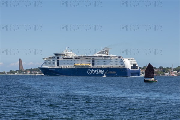 Sailboat and Color Line Cruises cruise ship off Laboe