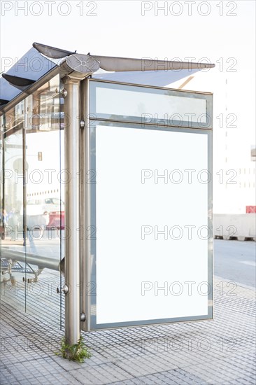 Bus stop with blank billboard