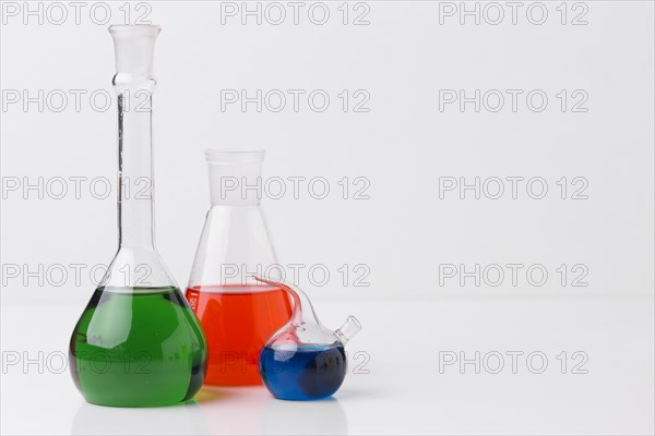 Front view science elements with chemicals arrangement with copy space