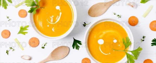 Top view delicious pumpkin soup table