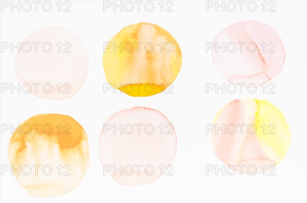 Watercolor circle brushstrokes design white backdrop