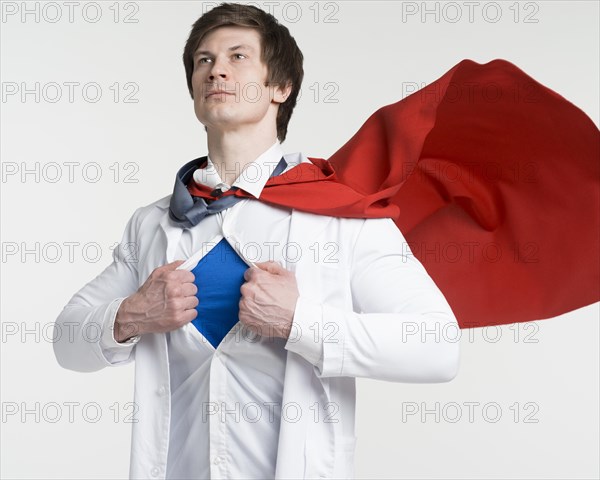 Medium shot doctor wearing cape