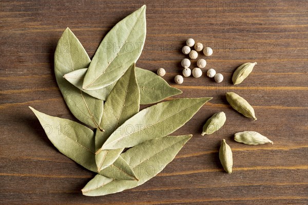 Top view bay leaves with pepper