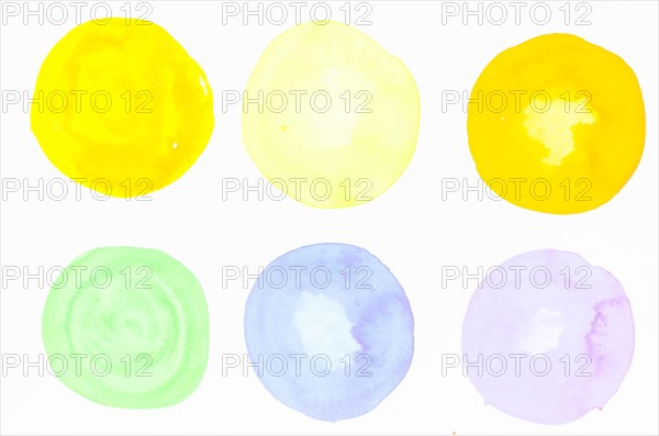 Colorful watercolor blots white backdrop