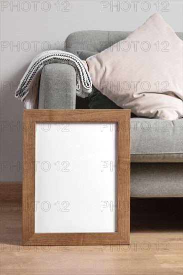Mock up frame beside couch