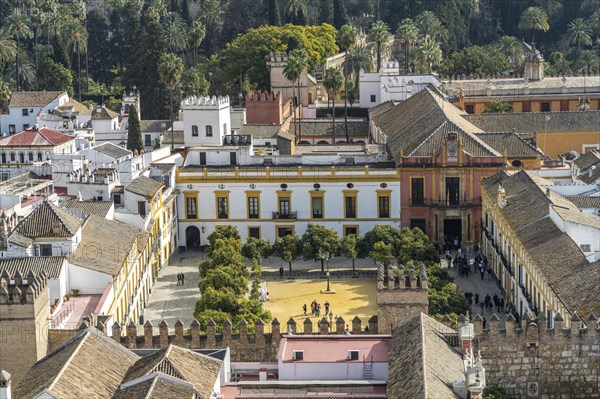View from the Cathedral to the Patio de Banderas and Royal Palace Alcazar in Seville Andalusia