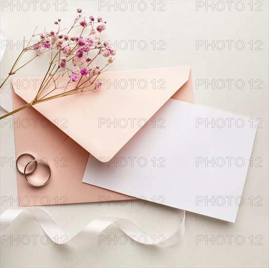 Pink flowers envelope save date wedding concept