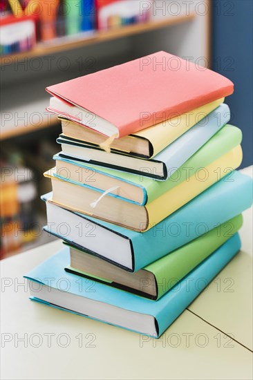 Stack multicolored books table