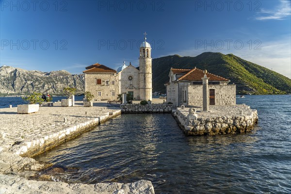 The artificial island of Gospa od Skrpjela with the church of St Mary on the rock near Perast on the Bay of Kotor